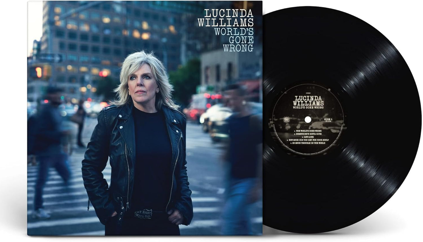 Lucinda Williams album cover featuring artist portrait and vinyl record.