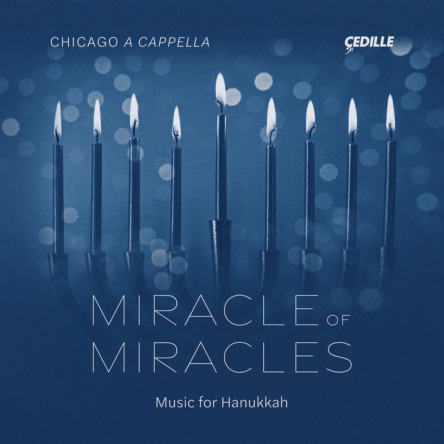 CD cover for “Miracle of Miracles” featuring lit Hanukkah candles.