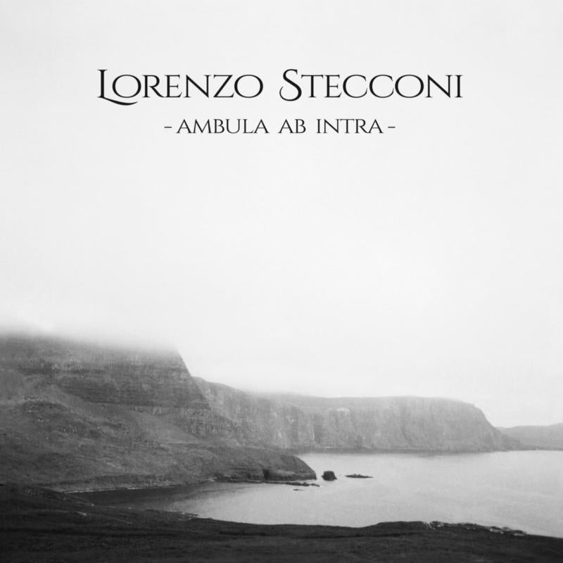 Black and white album cover with a coastal landscape and text.
