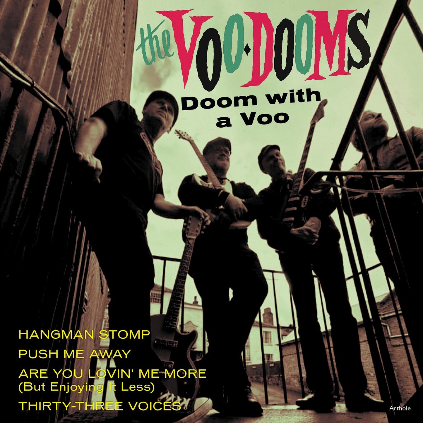 Record cover for "The Voo-Dooms" featuring a band on a rooftop.