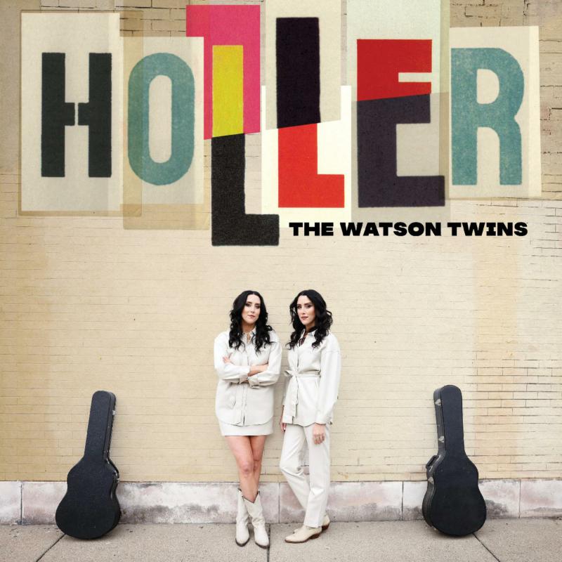Album cover for "Holler" by The Watson Twins, featuring two women and guitars.
