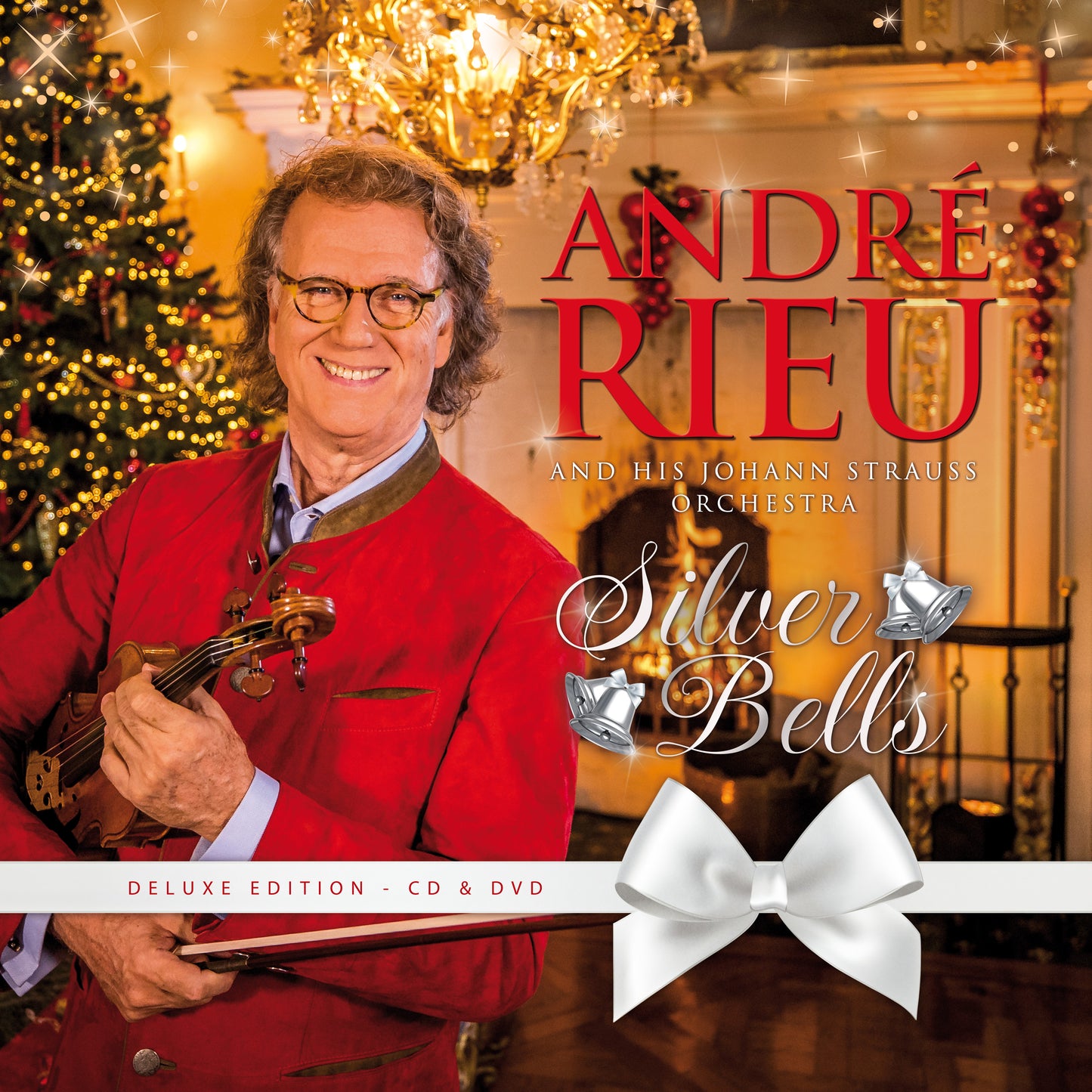 Andre Rieu holding a violin, album cover for "Silver Bells" CD.