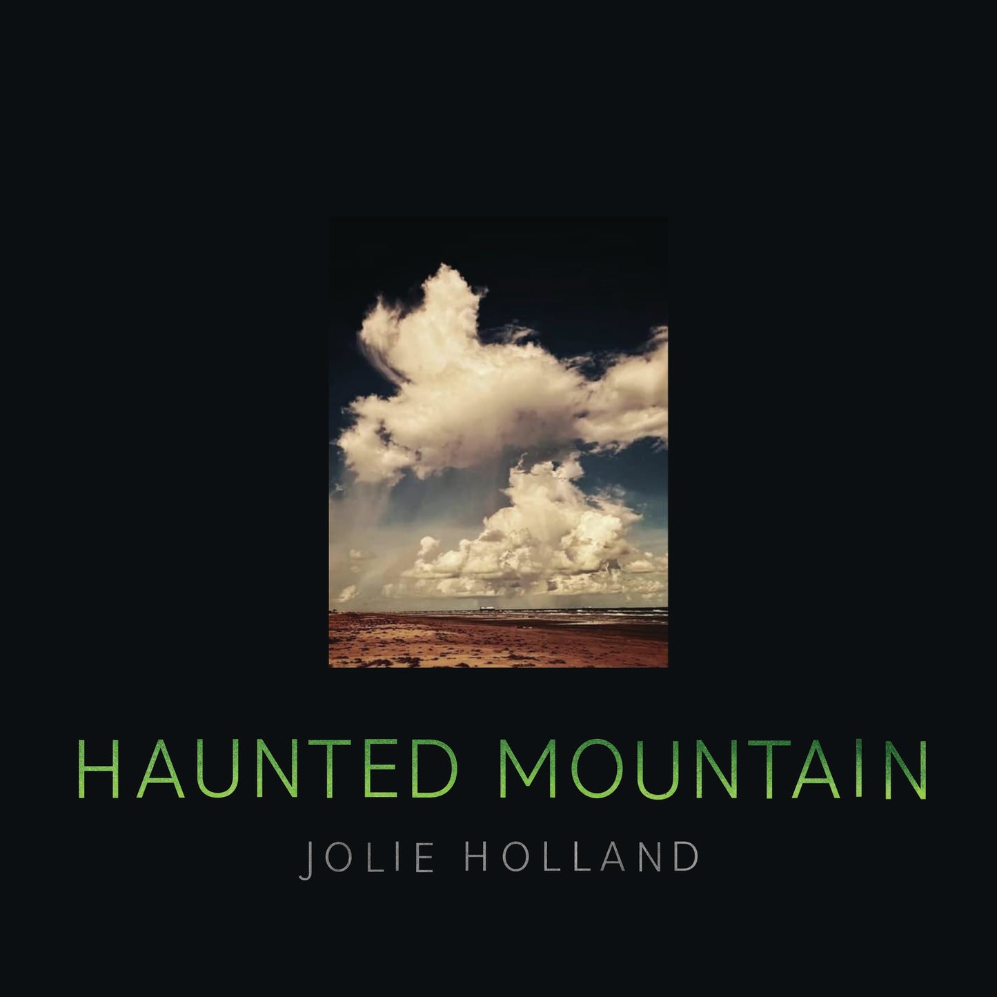 CD cover for Jolie Holland’s “Haunted Mountain” with a mountain landscape.