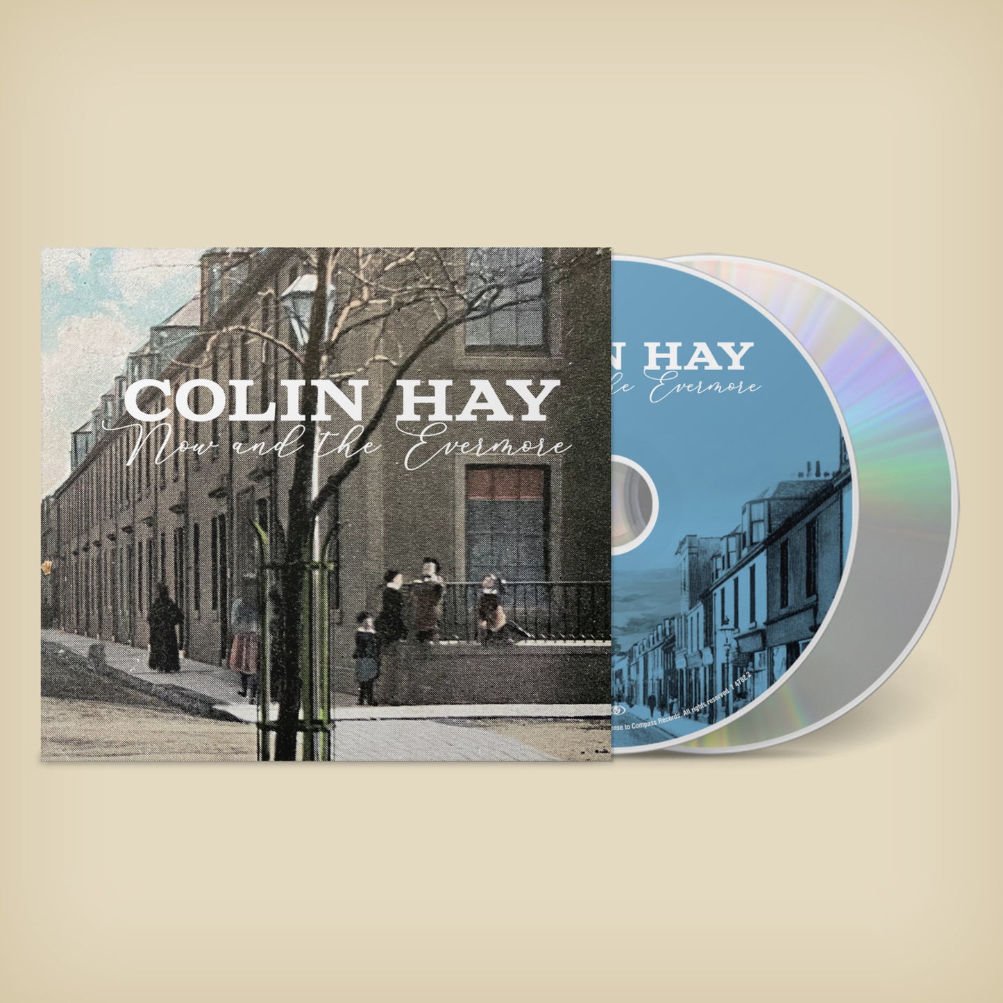 CD case for Colin Hay’s “Now And The Evermore” with a vintage street scene.