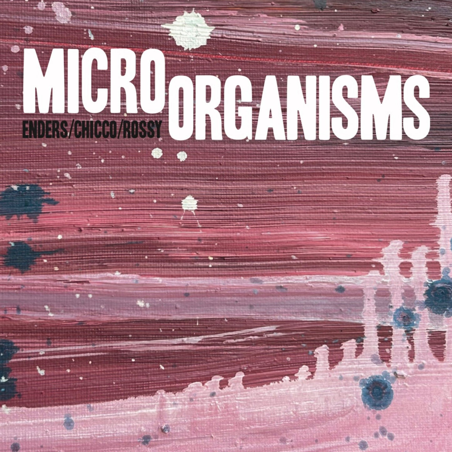 CD cover for “Micro Organisms” with abstract pink and blue artwork.