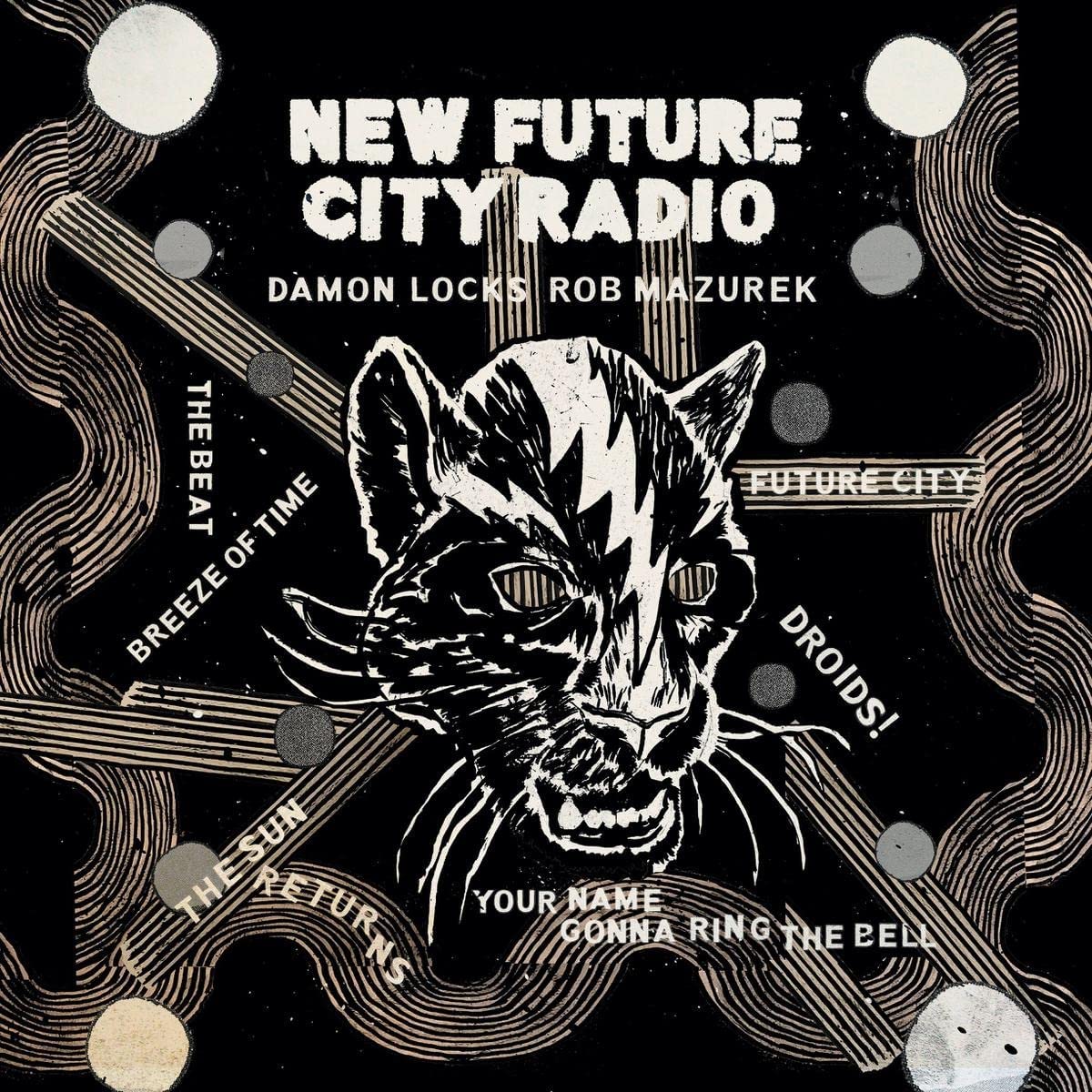 Black vinyl record cover with a stylized cat face and abstract graphics.
