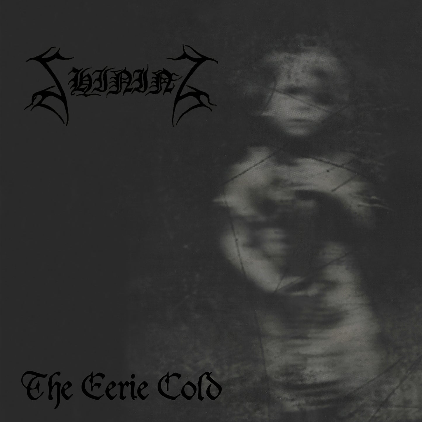 Dark album cover featuring a blurry, ghostly figure and the band logo and title.