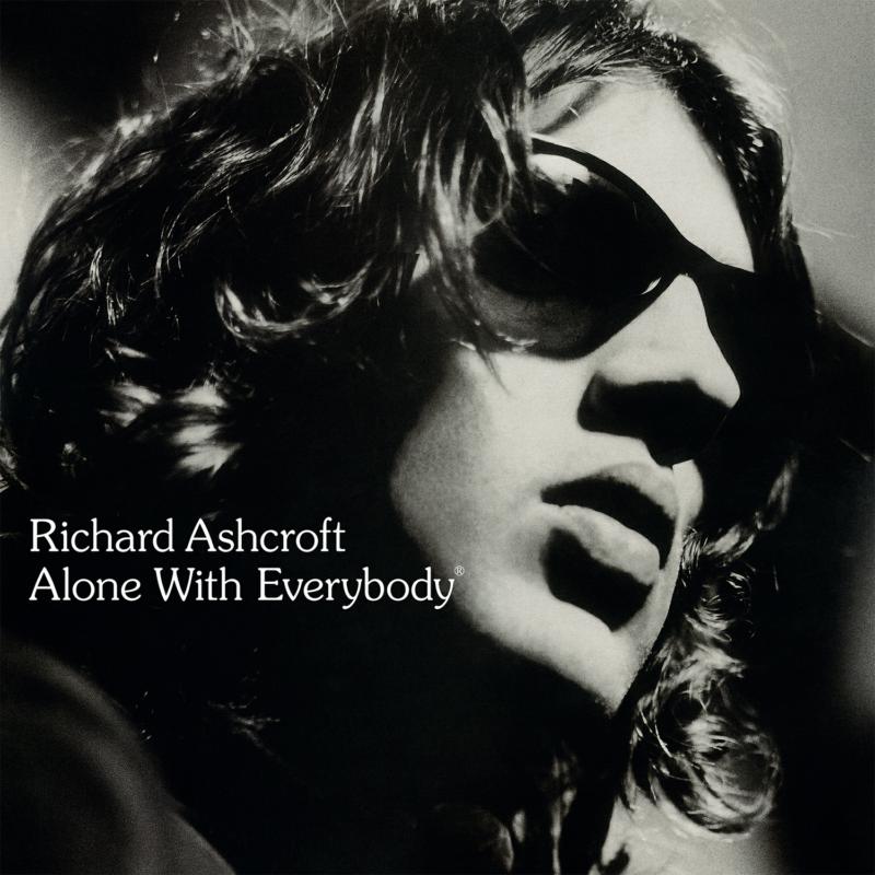 Black and white portrait of Richard Ashcroft wearing sunglasses, album cover.