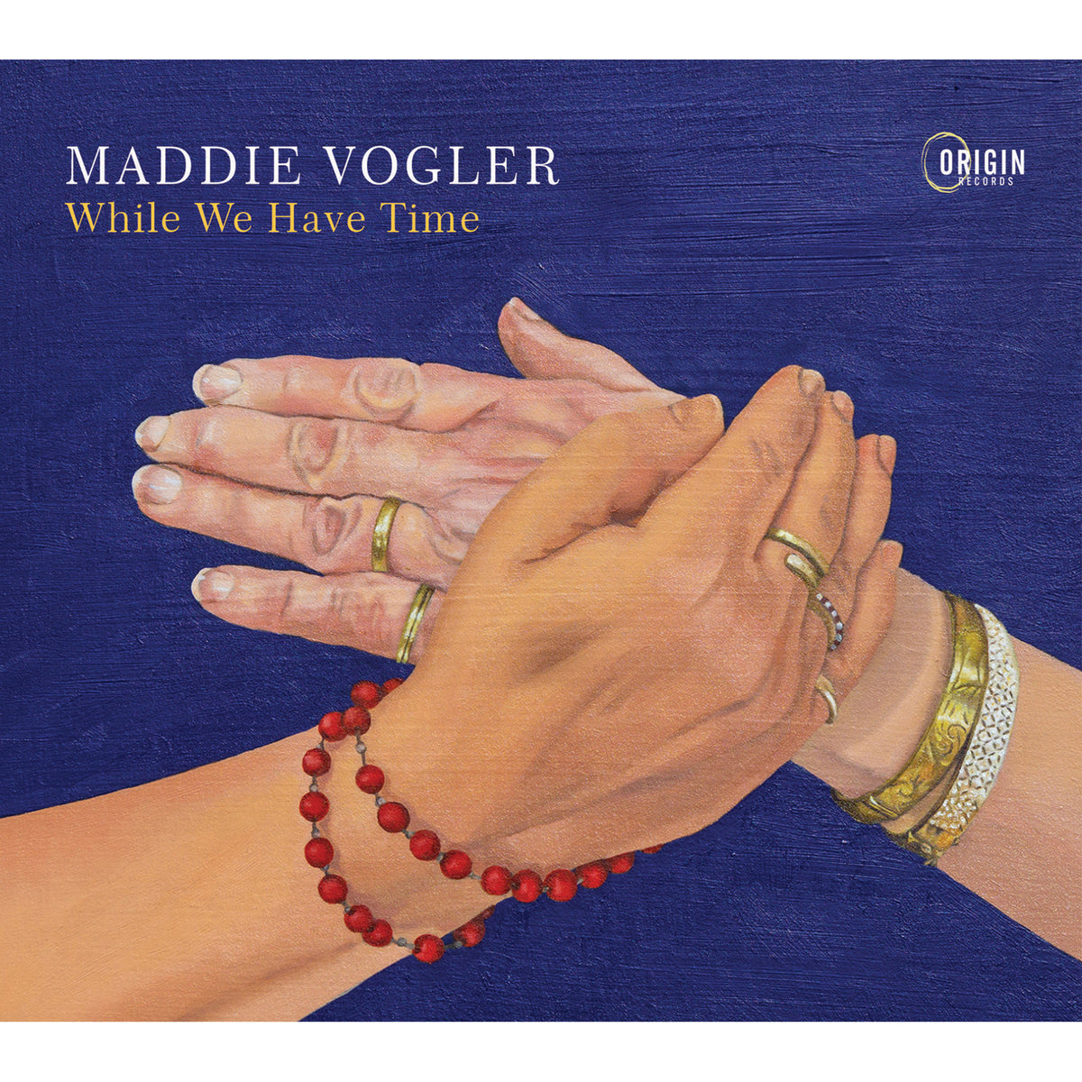 CD cover for Maddie Vogler’s “While We Have Time” featuring clasped hands.