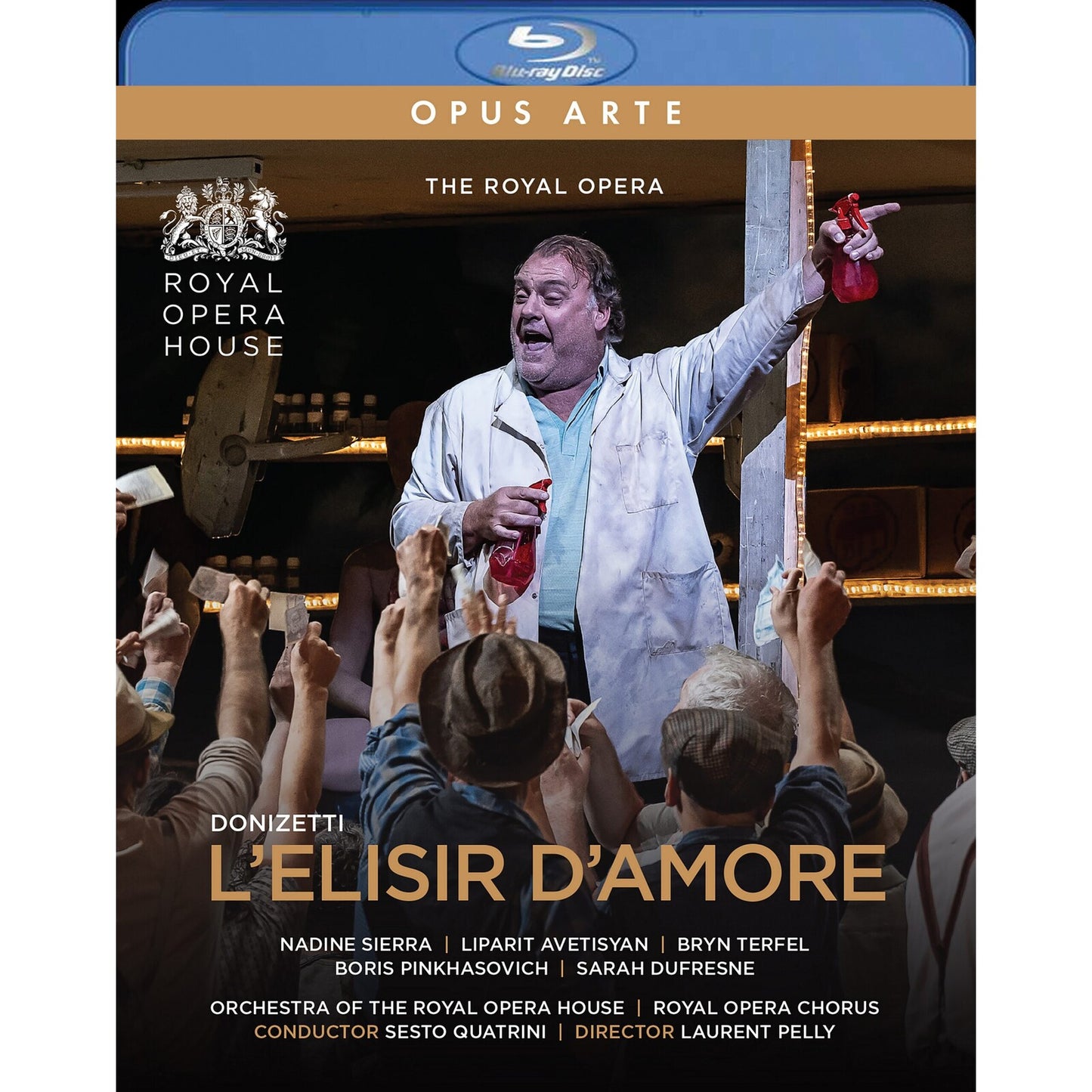 Blu-ray cover for Donizetti’s opera *L’Elisir d’Amore* featuring a stage scene.