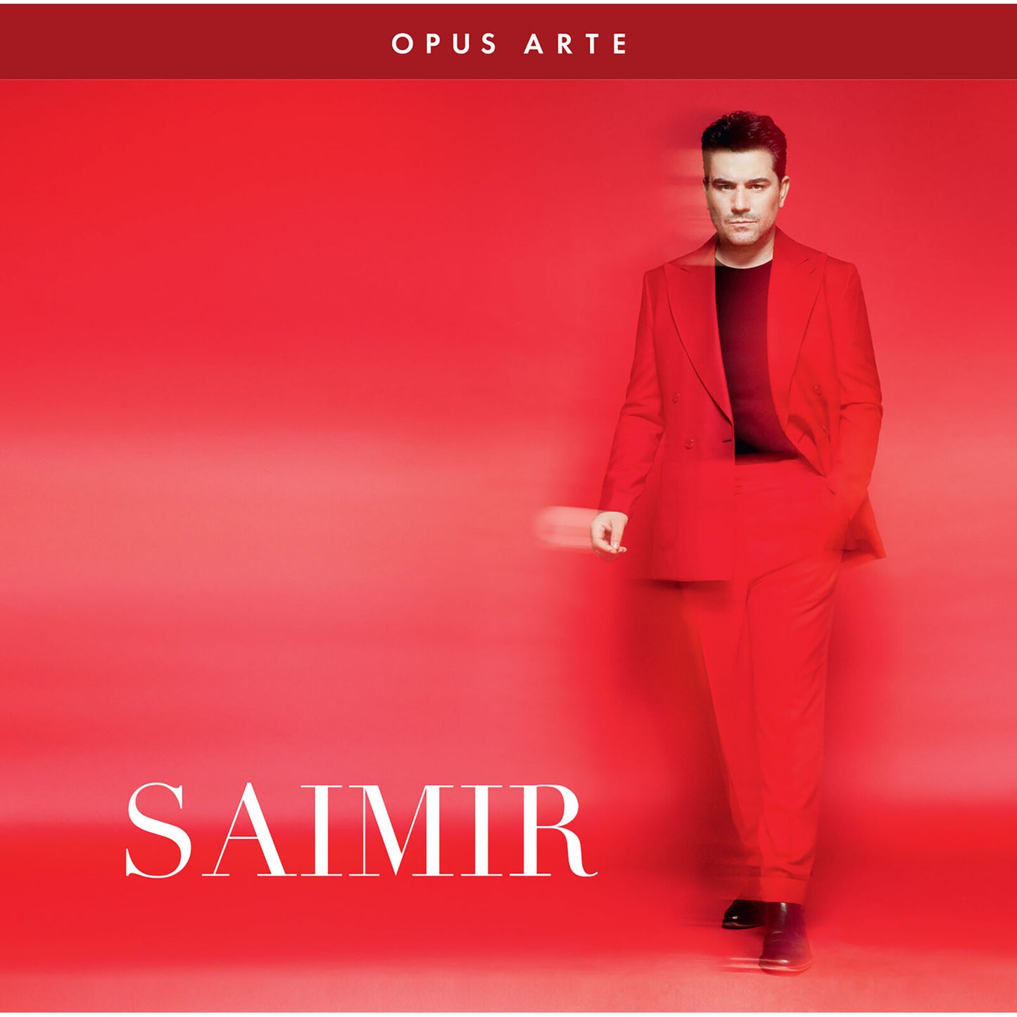 Red album cover featuring a portrait of Saimir Pirgu in a red suit.