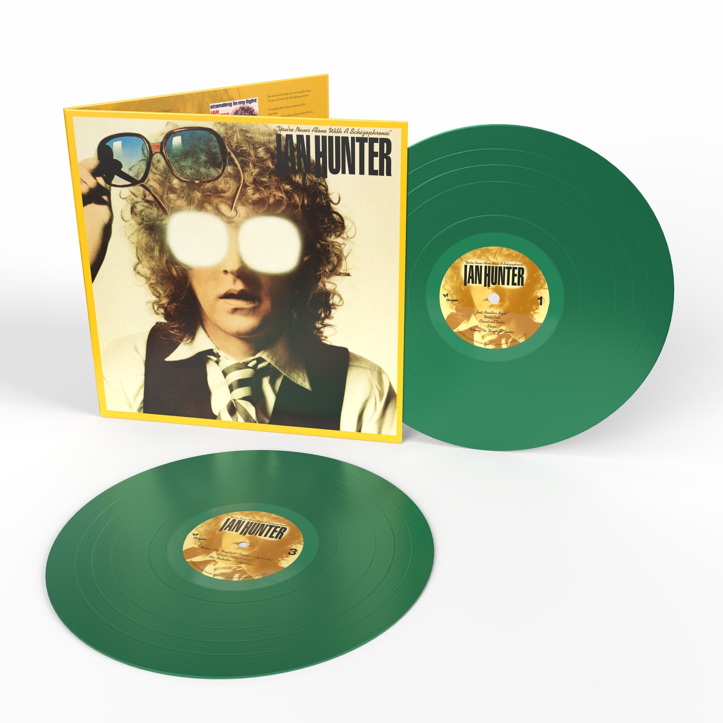 Ian Hunter album cover and two green vinyl records displayed.