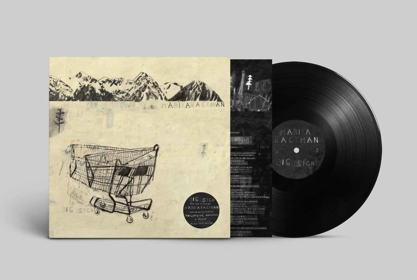 Vinyl record and cover art featuring a sketch of a shopping cart and mountains.