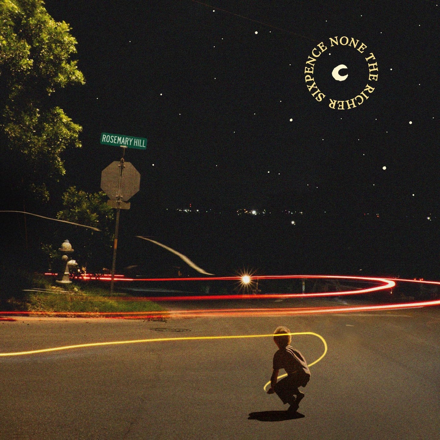 CD cover: nighttime street scene with a child and light trails.