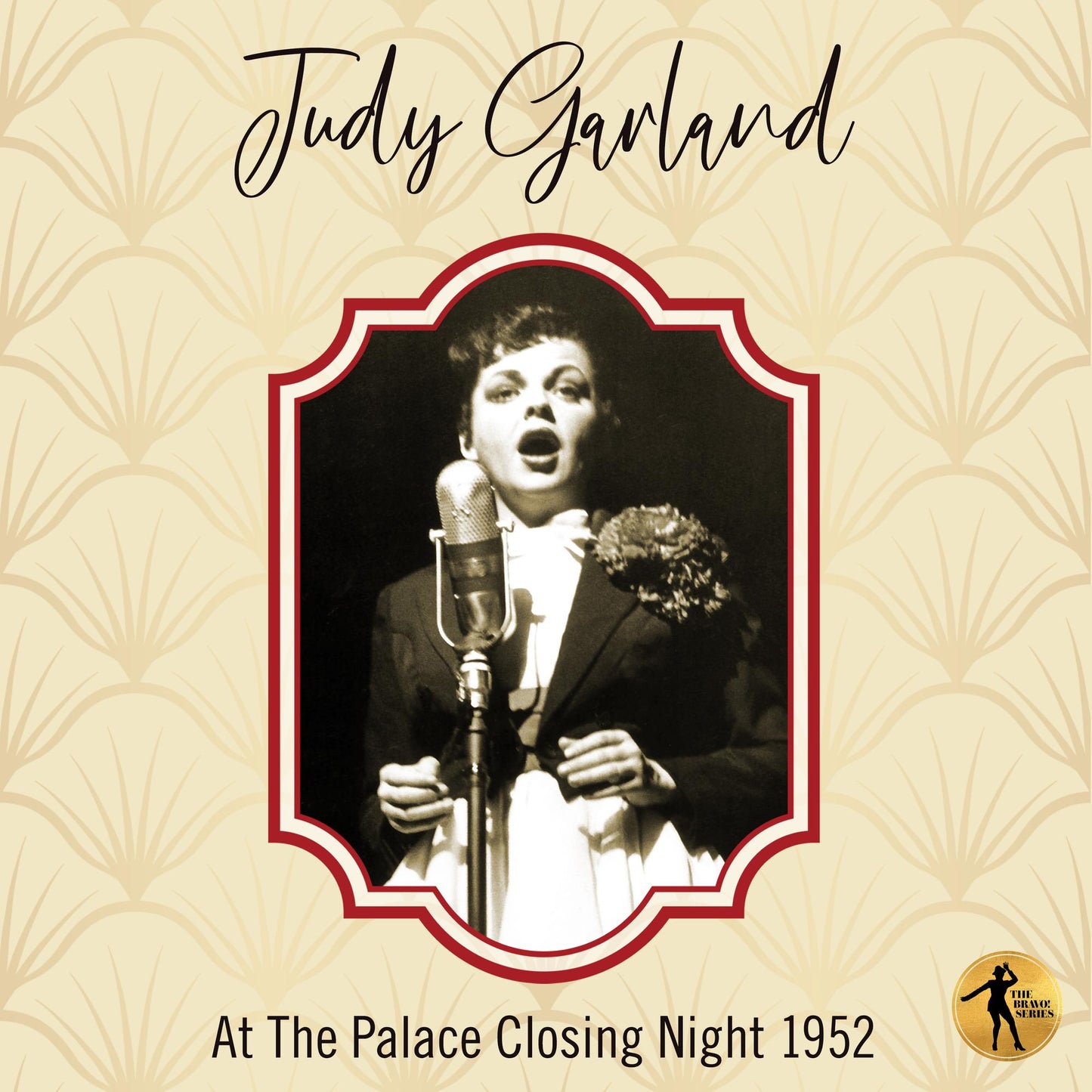 Judy Garland in black and white, singing into a vintage microphone.
