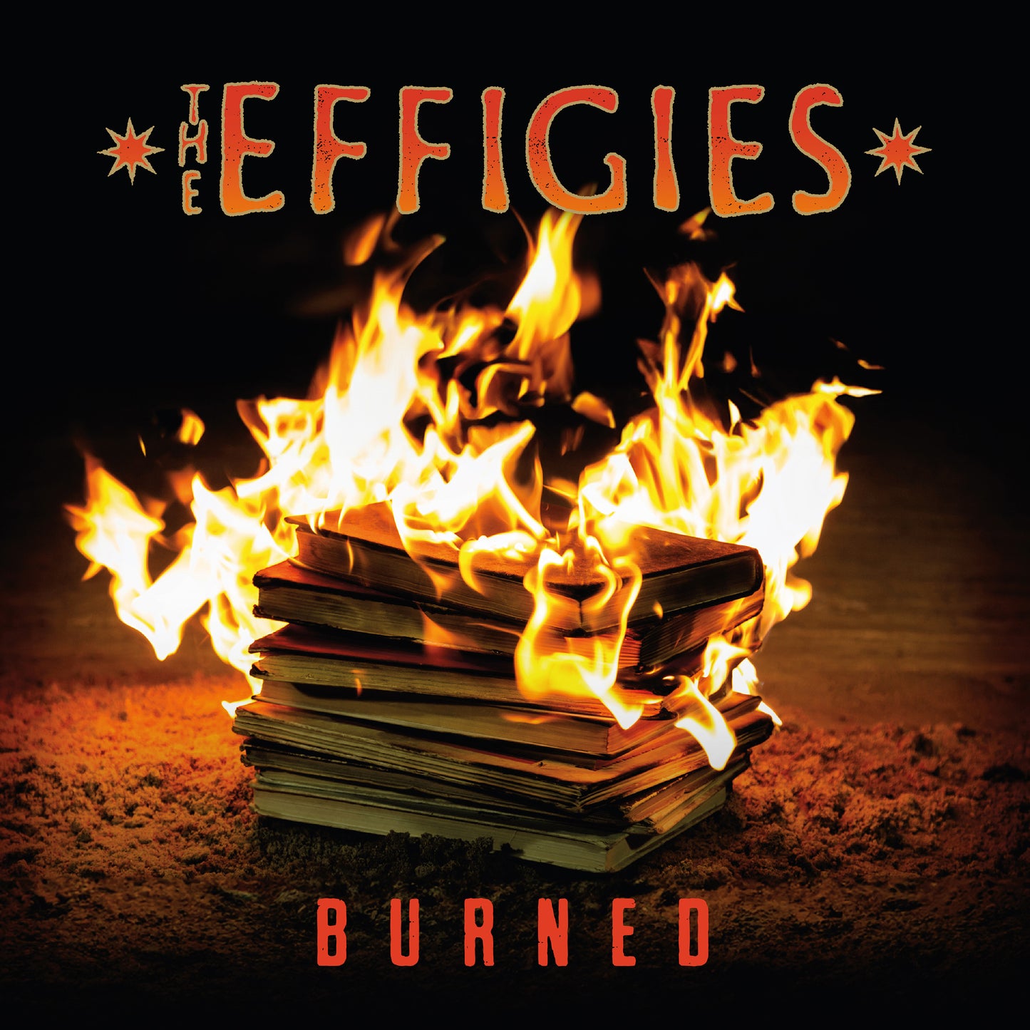 Burning books with flames, album cover for “Burned” by Effigies.