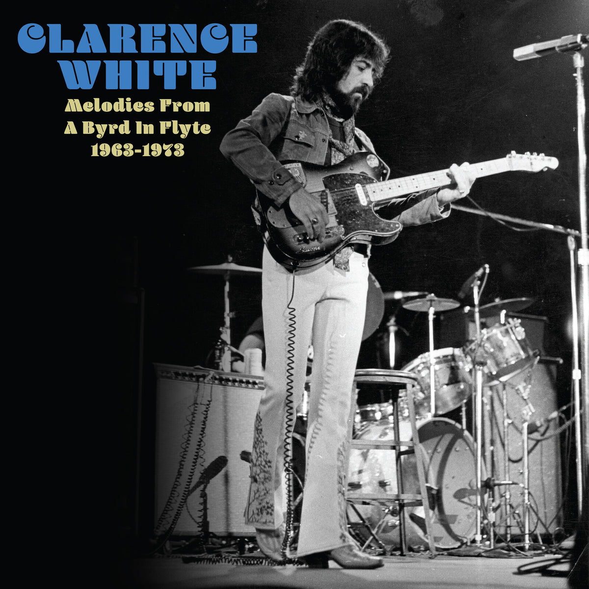 Clarence White playing guitar on stage, album cover for "Melodies From A Byrd In Flyte".
