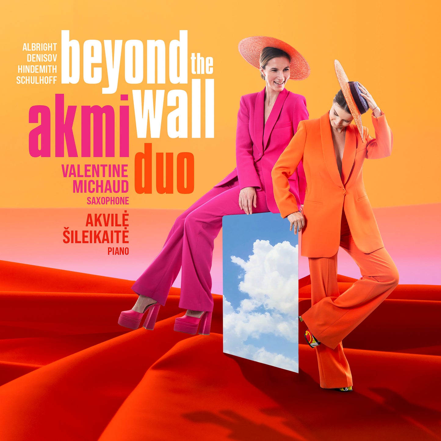 CD cover featuring two people in orange suits leaning against a cloud.