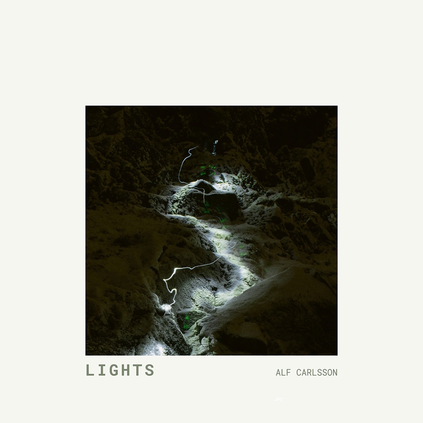 CD cover: dark, textured landscape with bright, winding light streaks.