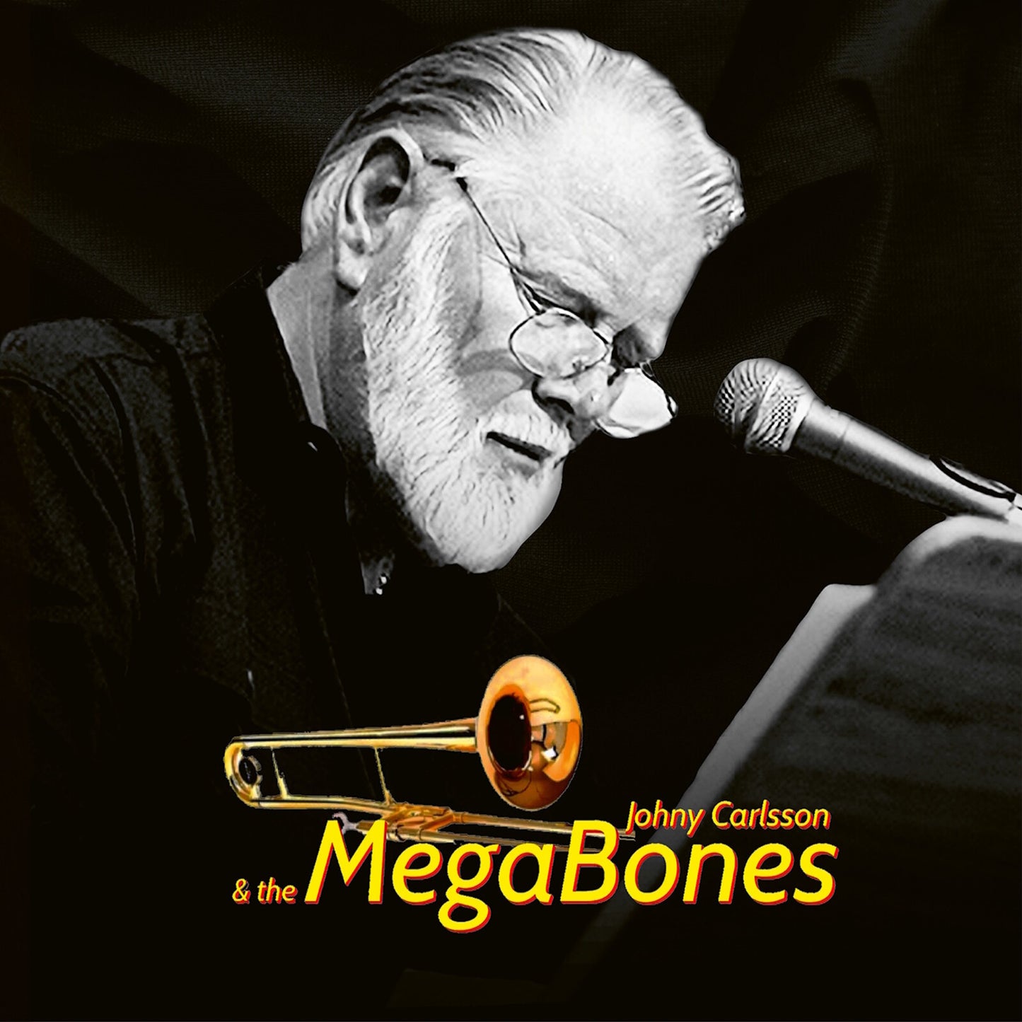 Black and white portrait of a man playing a trombone into a microphone.
