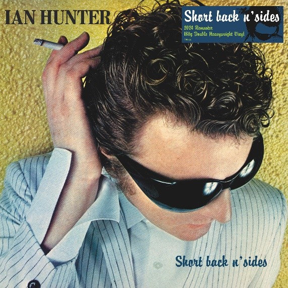 Ian Hunter album cover: man with sunglasses and messy hair.