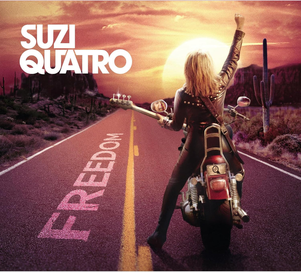 Suzi Quatro on a motorcycle, desert landscape, album cover "Freedom".