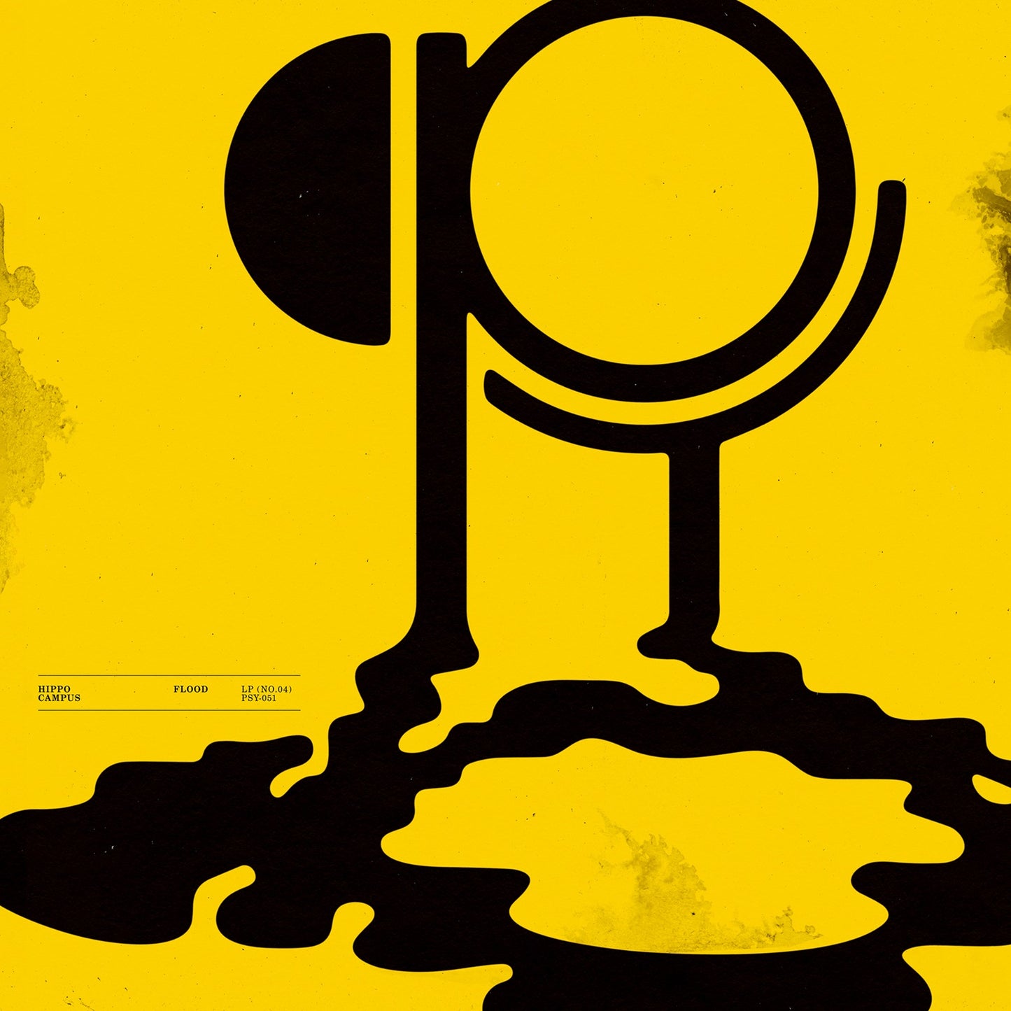 Yellow album cover with a black abstract shape resembling a puddle.