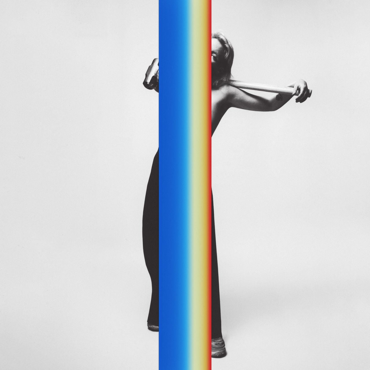 Sylvan Esso album cover: woman with rubber band, split blue and rainbow design.
