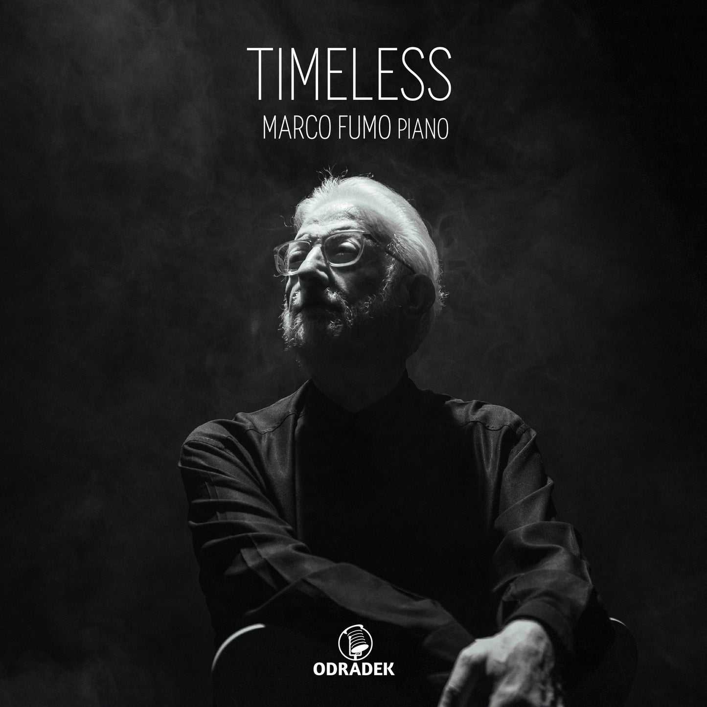 Black and white album cover featuring pianist Marco Fumo in profile.