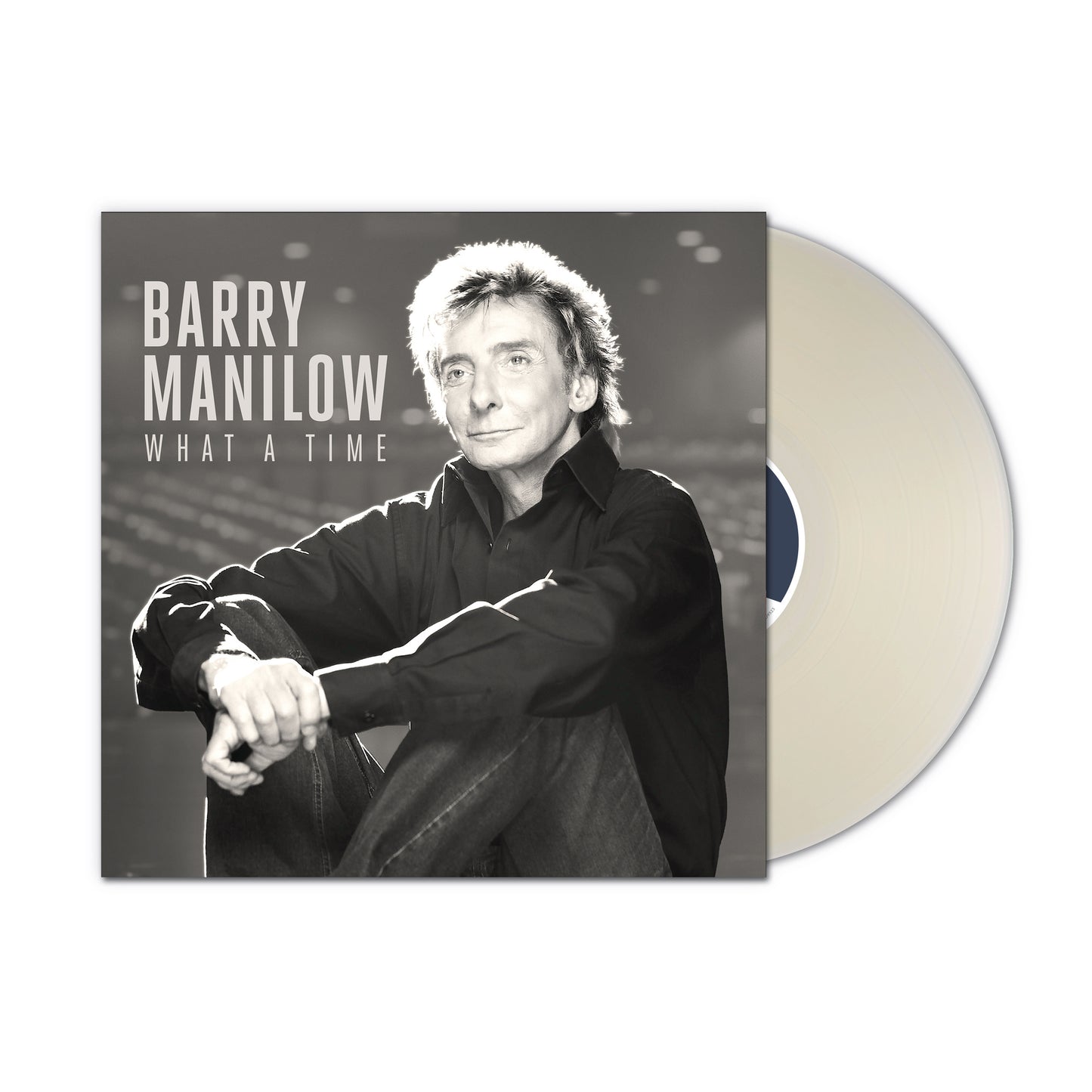Barry Manilow album cover with a milky clear vinyl record beside it.