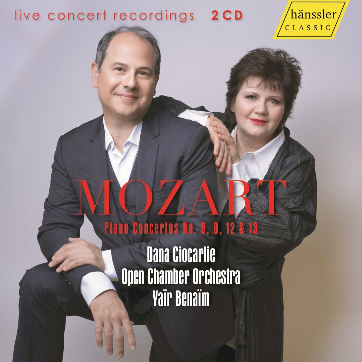 CD cover featuring two musicians and text: Mozart Piano Concertos.