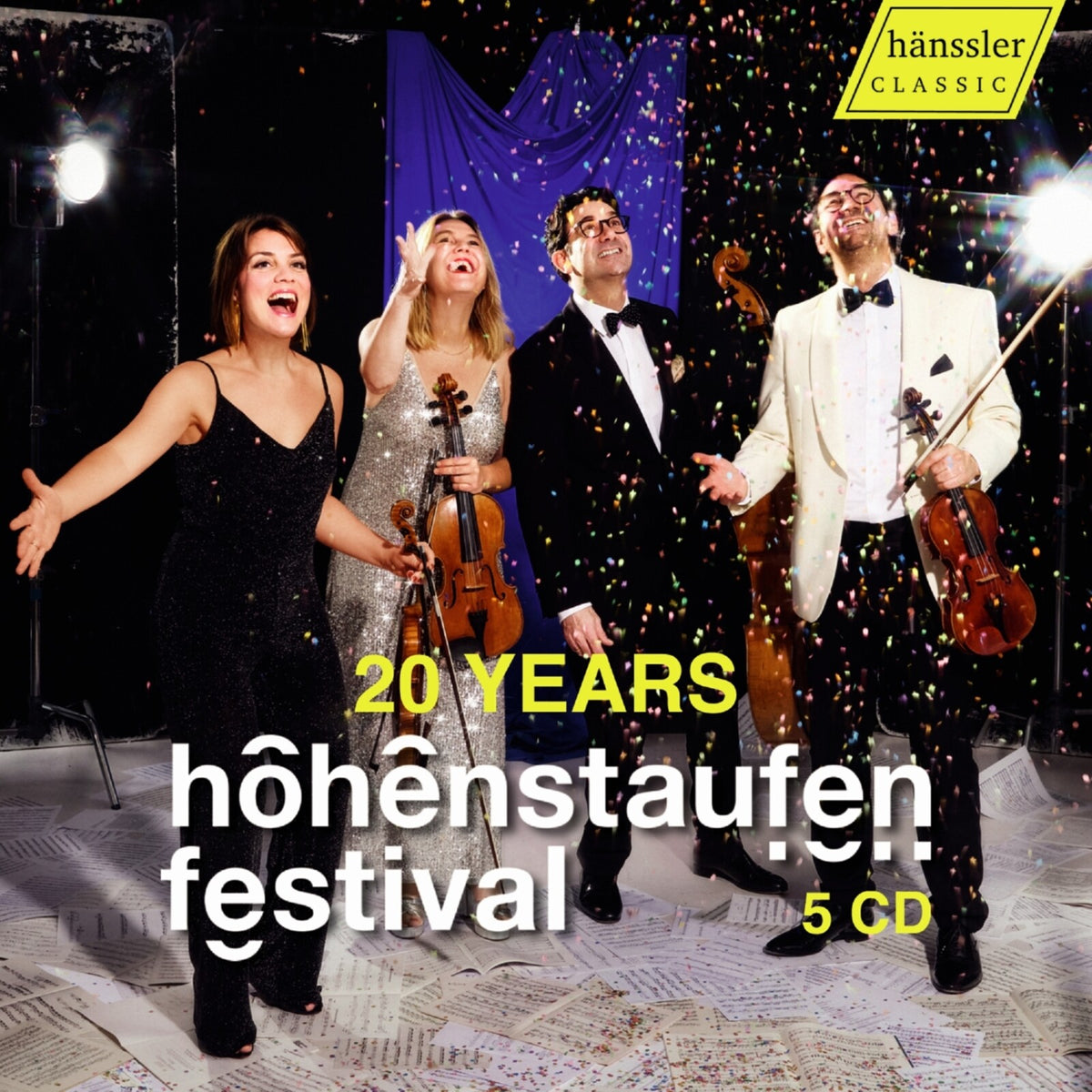 CD cover featuring four musicians performing with confetti falling.