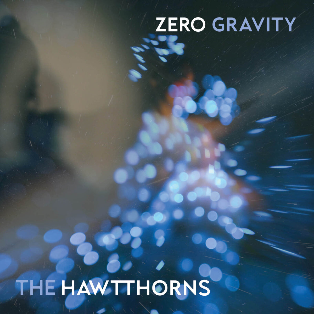 Album cover for The Hawtthorns’ “Zero Gravity” with blue light streaks.
