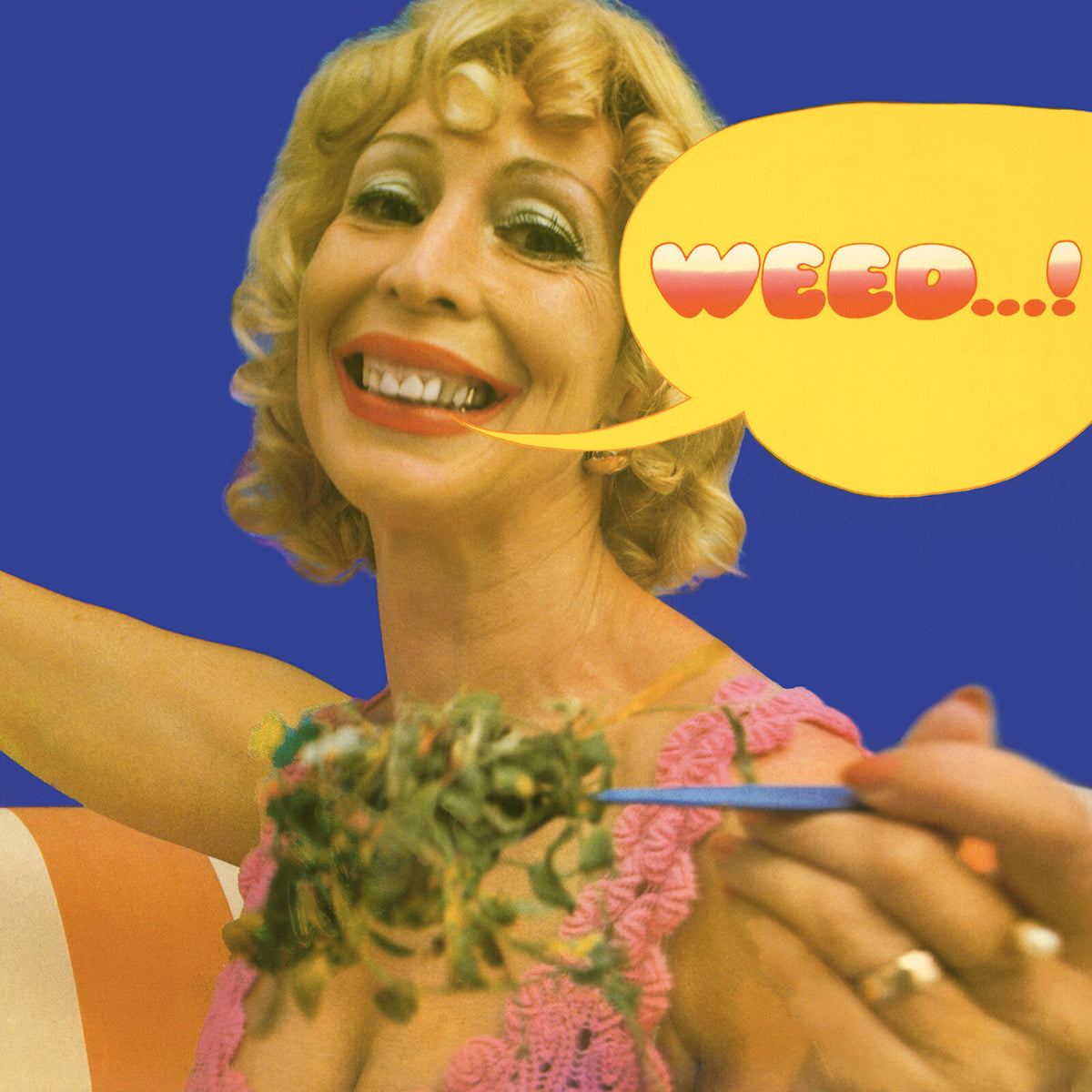 Woman with blonde hair holds cannabis, speech bubble says "WEED...!