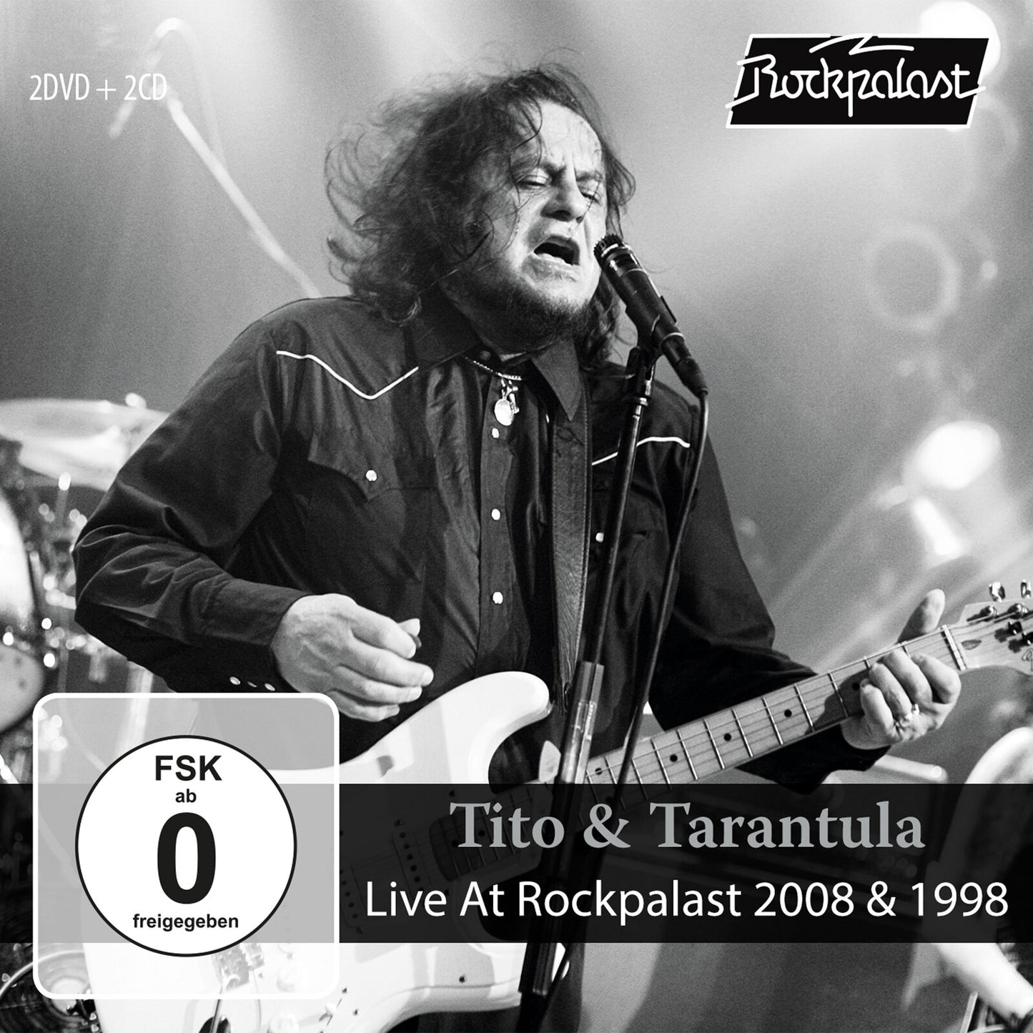 Black and white album cover featuring Tito & Tarantula performing live.