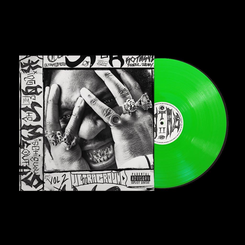 Denzel Curry vinyl record with a green disc and hand illustration.