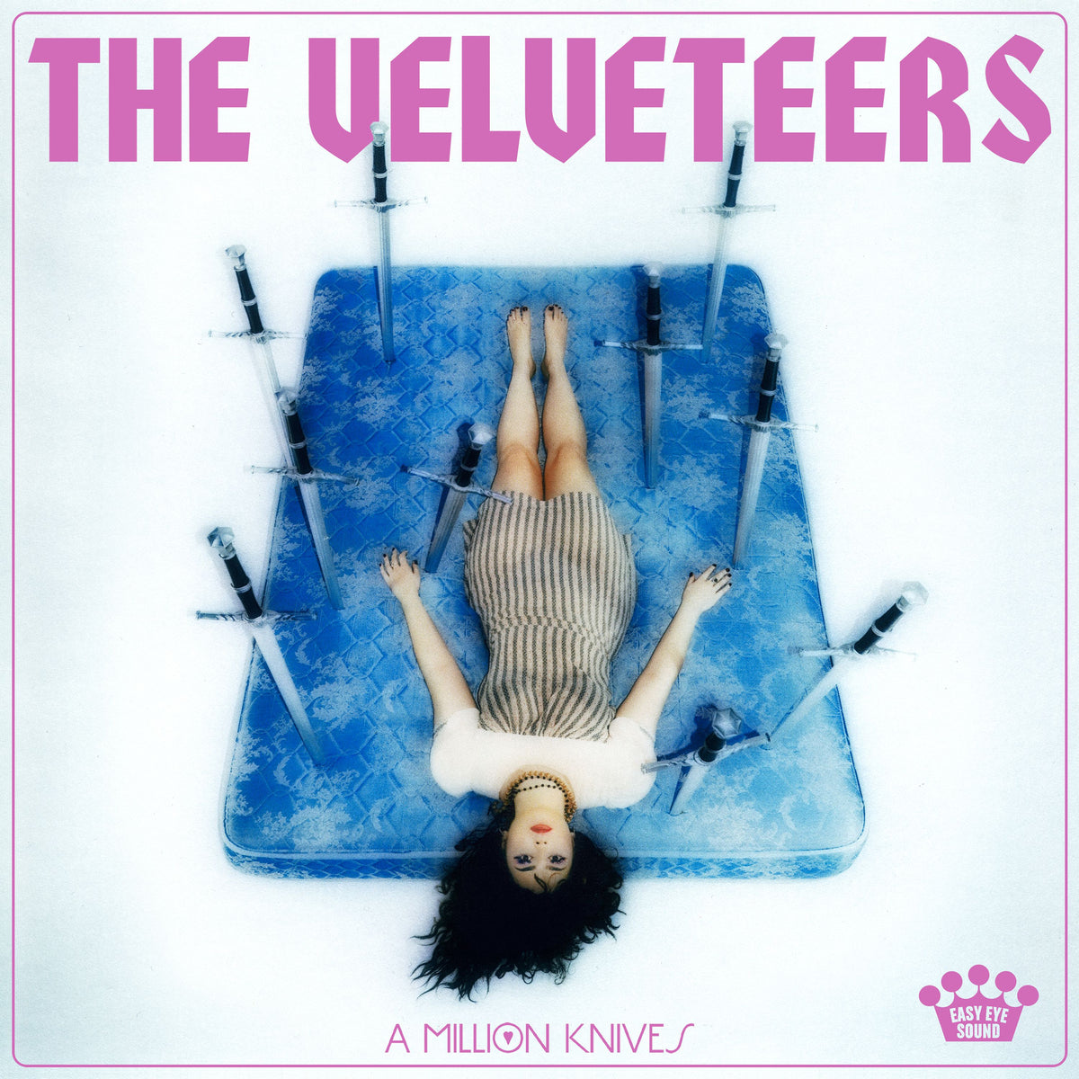 Vinyl record cover for "A Million Knives" by The Velveteens, with knives.