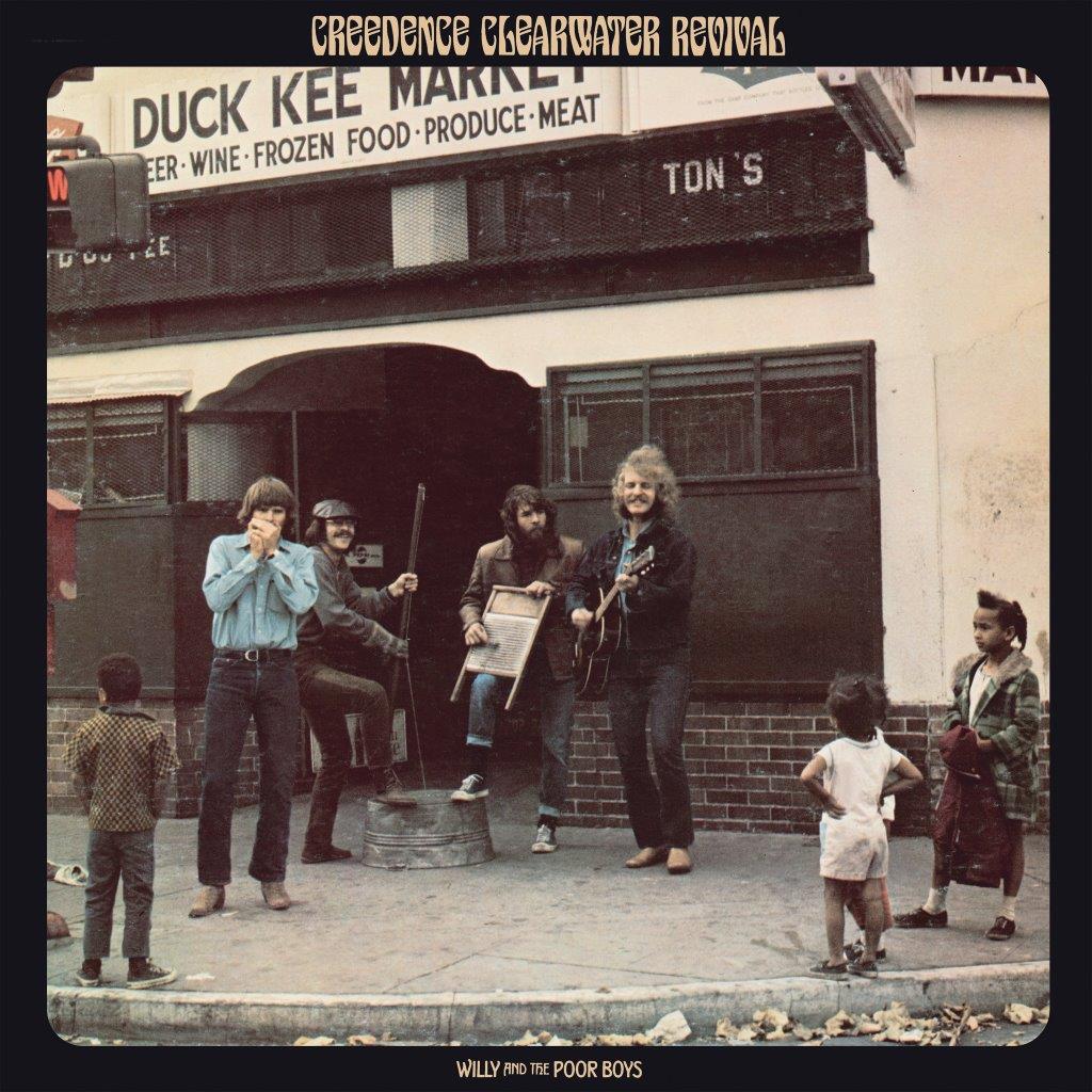 Creedence Clearwater Revival album cover with musicians and a storefront.