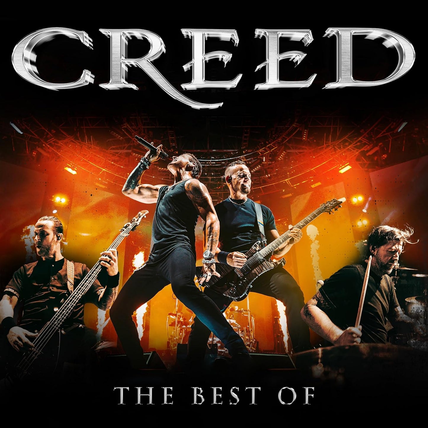 The band Creed performing live on stage with orange lighting and pyrotechnics in background.