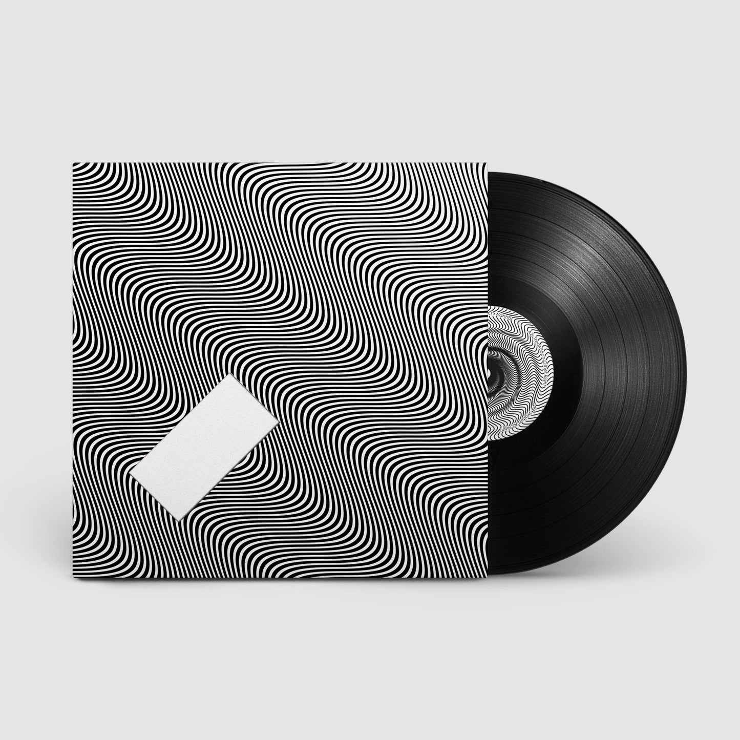 Vinyl record with Jamie xx album In Waves cover art on sleeve packaging.