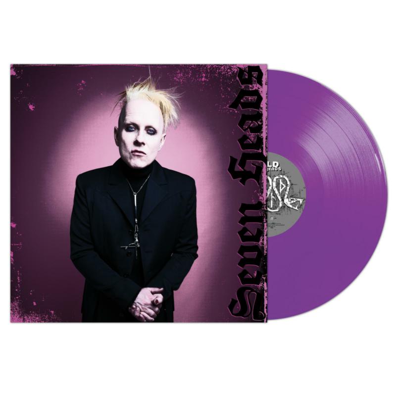 Purple vinyl record with portrait of a pale man in a suit.