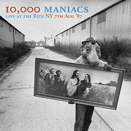 10,000 Maniacs album cover: person with framed band portrait and animal head.