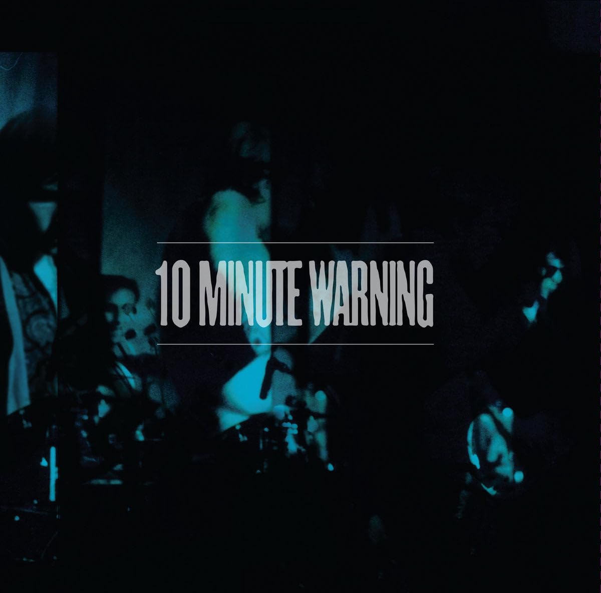 Dark album cover with band name "10 Minute Warning" in white text.