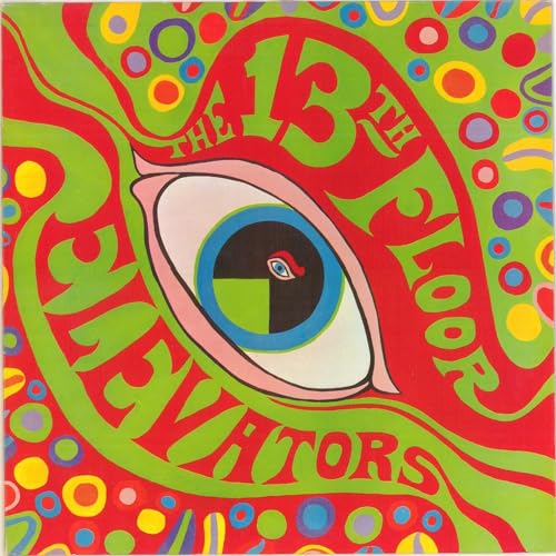 Psychedelic album cover featuring a large eye surrounded by swirling green and red patterns.