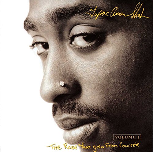 Close-up portrait of Tupac Shakur, sepia tone, with album title text.