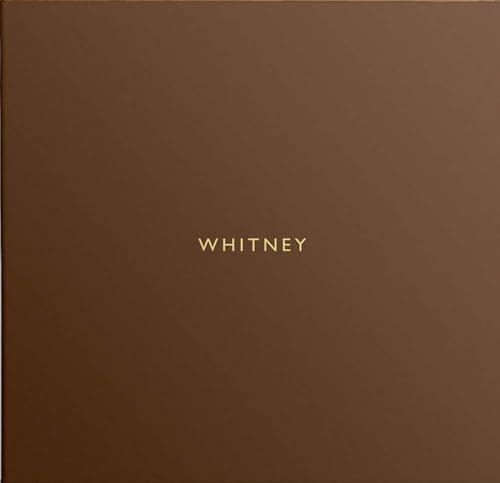 Brown vinyl record cover with gold text reading "WHITNEY".