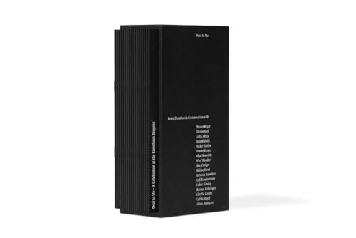 A black book titled Dear to Me with a ribbed spine and white text.