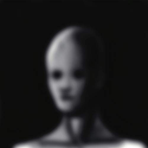 Blurred, grayscale portrait of a person, likely a vinyl record cover.