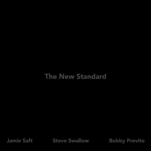 Black CD cover with white text: "The New Standard" and artist names.