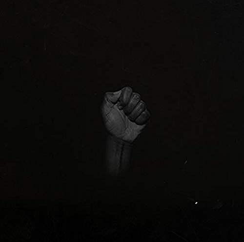 Raised fist against a dark background, album cover for Sault’s “Untitled (Black Is)”.
